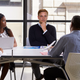 Illustration for article titled Employee Apparently Confident Enough In Job Performance To Eat Snacks During Meeting